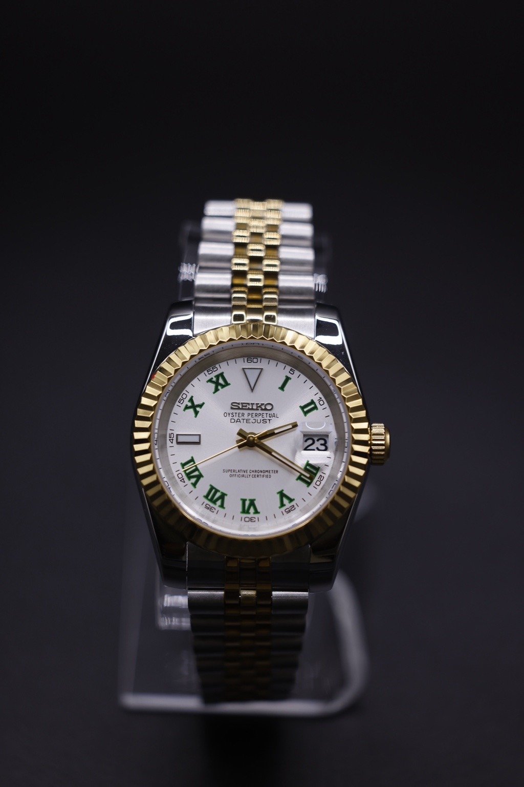 Calm Second past build: Two-tone bracelet · green Roman numerals